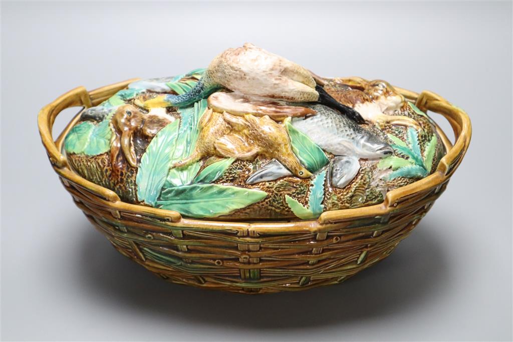 A George Jones maiolica game pie dish, liner and cover, width 32cm height 21cm